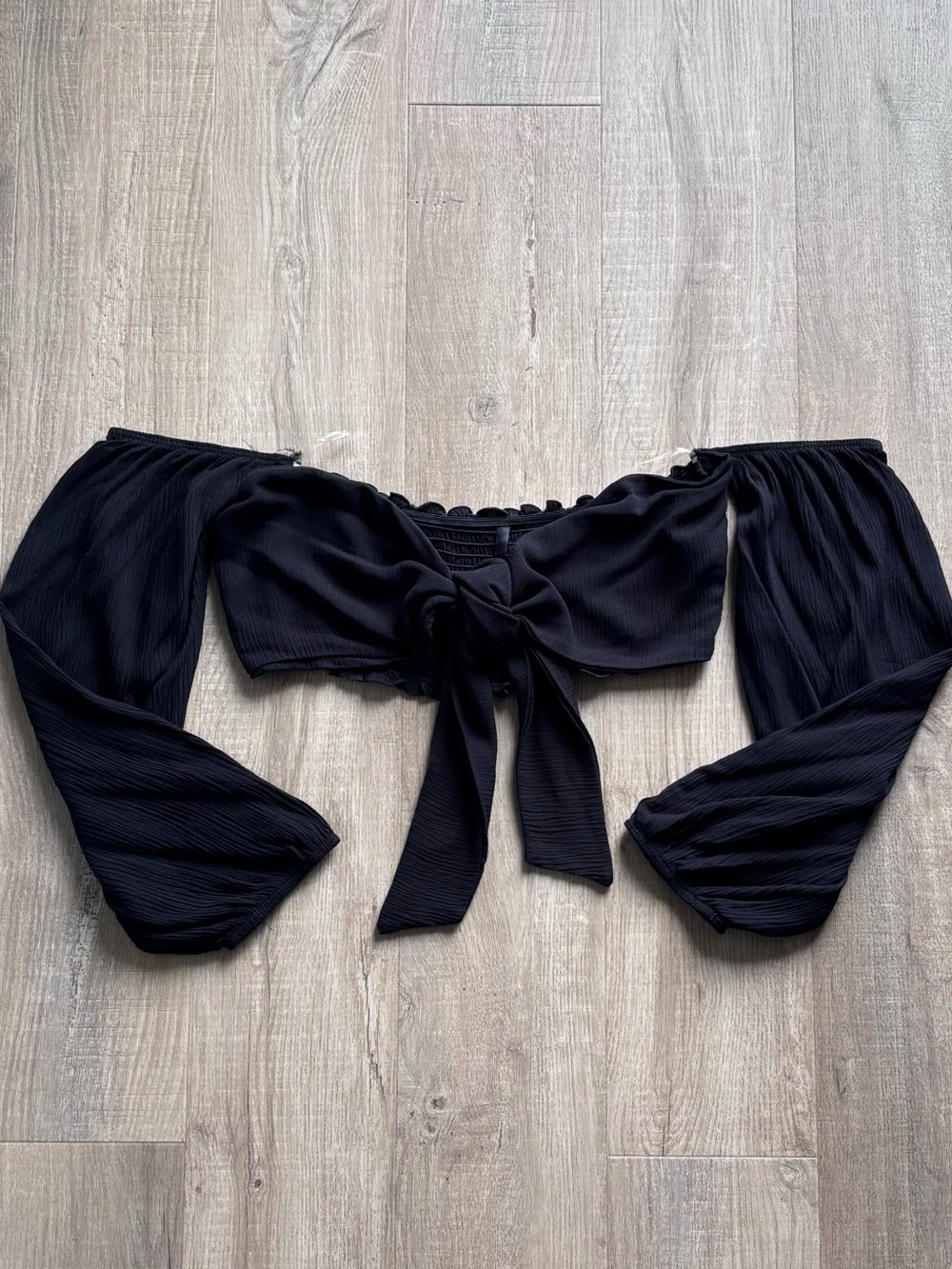 Off the Shoulder Longsleeve Tie Front Crop Top in Black